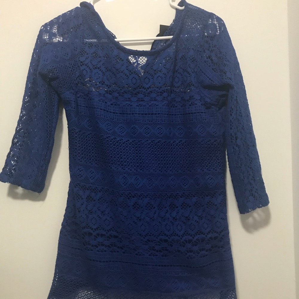 A blue crocheted top
